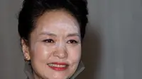 Ibu negara Tiongkok ini tampak aneh dengan make up berantakan