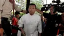 Nusron Wahid berjalan memasuk gedung KPK, Jakarta, Jumat (5/12/2014). (Liputan6.com/Miftahul Hayat)