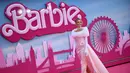 <p>Aktris Australia Margot Robbie berpose di karpet merah muda setibanya untuk pemutaran perdana Eropa Film "Barbie" di London pusat pada 12 Juli 2023. (AFP/Justin Tallis)</p>