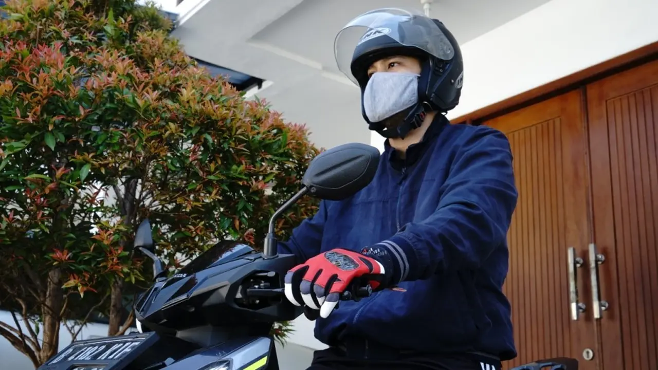Berkendara di era new normal selalu menggunakan masker
