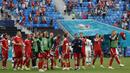 Skor 1-0 tak berubah hingga peluit panjang akhir pertandingan dibunyikan. Kemenangan Rusia ini menempatkan mereka pada posisi kedua klasemen sementara Grup B Euro 2020 di bawah Belgia. (Foto: AP/Pool/Evgenia Novozhenina)