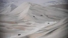 Sejumlah pembalap bersaing dalam Reli Dakar 2018 di sekitar Kota Pisco, Peru, (7/1). Reli Dakar 2018 edisi ke-40 ini akan membawa pembalap melintasi  Peru, Bolivia, dan Argentina. (Franck FIFE/AFP)