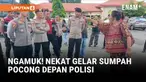 Aparat kepolisian dikagetkan upaya seorang wanita yang ingin gelar sumpah pocong di halaman Mapolres Sikka, Nusa Tenggara Timur, Selasa (13/1).