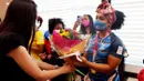 Neisi Patricia Dajomes Barrera sukses meraih medali emas usai berhasil menjadi yang terbaik pada pertandingan angkat besi 76kg putri di Olimpiade Tokyo 2020. (Foto: AFP/Ecuador's Ministry of Sports)