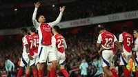 Raihan tiga poin penting bagi Arsenal untuk terus mengejar Liverpool di puncak klasemen sementara Liga Inggris 2024/2025. Sementara, Manchester United masih tertahan di peringkat ke-11 dengan 19 poin dari 14 laga. (Adrian Dennis/AFP)