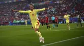 Penyerang Spanyol Ferran Torres merayakan gol pembuka untuk timnya yang dicetak ke gawang Alabnia pada duel matchday terakhir Grup B Euro 2024 di Dusseldorf Arena, Selasa (25/6/2024) dini hari WIB. (AP Photo/Alessandra Tarantino)