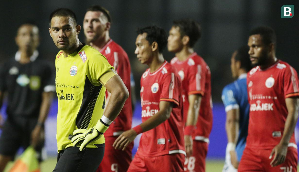 Pemain Persija Jakarta tampak kecewa usai ditaklukkan Persib Bandung pada laga Liga 1 di Stadion GBLA, Jawa Barat, Minggu (23/9/2018). Persib menang 3-2 atas Persija. (Bola.com/M Iqbal Ichsan)
