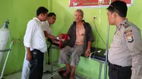 Seorang bapak di Kabupaten Takalar, Sulsel jadi korban pembacokan dari putra kandungnya sendiri (Liputan6.com/ Eka Hakim)