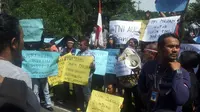 Jurnalis berbagai kota gelar aksi unjuk rasa kecam kekerasan aparat di Medan (Liputan6.com / Reza Perdana)