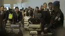 Para pemain Indonesia saat tiba di Bandara Soekarno-Hatta, Tangerang, Rabu, (30/8/2017). Pemain Indonesia disambut para fans sepulangnya dari SEA Games di Malaysia. (Bola.com/M Iqbal Ichsan)