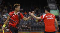 Pasangan ganda campuran Indonesia, Tontowi Ahmad/Liliyana Natsir, saat menghadapi ganda campuran Malaysia, Chan Peng Soon/Goh Liu Ying, di final cabang bulutangkis Olimpiade Rio de Janeiro 2016 (Reuters).