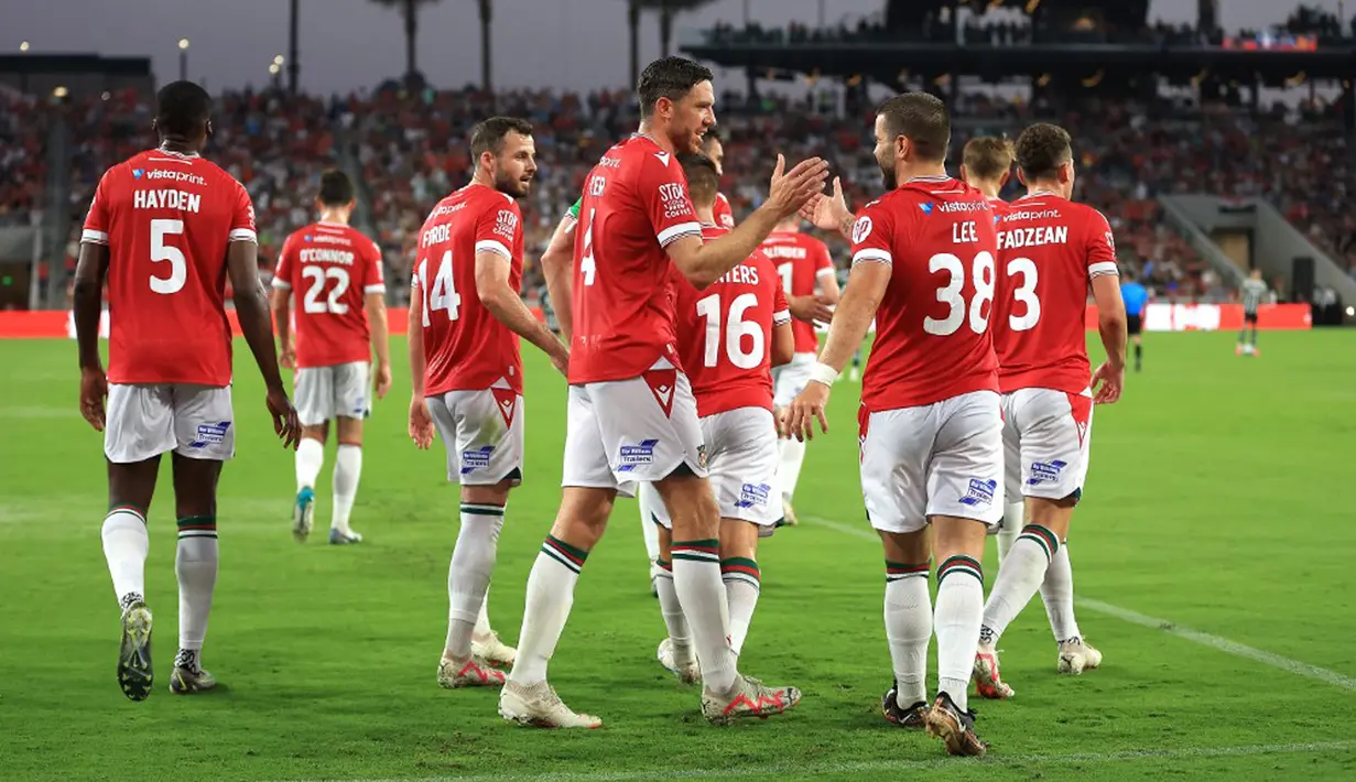 Manchester United akan melanjutkan pramusim melawan Real Madrid pada 27 Juli 2023. Laga itu akan berlangsung di NRG Stadium pada pukul 7.30 WIB. (Sean M. Haffey/Getty Images/AFP)