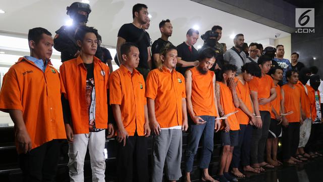 Polisi Tunjukkan Tersangka dan Barang Bukti Kerusuhan Aksi 22 Mei