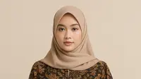 Model Tunik Batik Longgar Lengan Bishop/AI