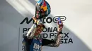 Pembalap asal Spanyol dari tim BK8 Gresini Racing MotoGP, Alex Marquez, tampil tercepat pada MotoGP Malaysia 2025. Ia finis pertama dengan catatan waktu 40:09,24 menit pada balapan yang digelar di Sirkuit Internasional Sepang, Malaysia, Minggu (26/10/2025). (Lillian SUWANRUMPHA/AFP)