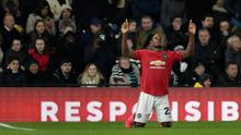 Pemain Manchester United Odion Ighalo melakukan selebrasi usai mencetak gol ke gawang Derby County pada pertandingan putaran kelima Piala FA di Pride Park, Derby, Inggris, Kamis (5/3/2020). Manchester United menang dengan skor 3-0. (AP Photo/Rui Vieira)