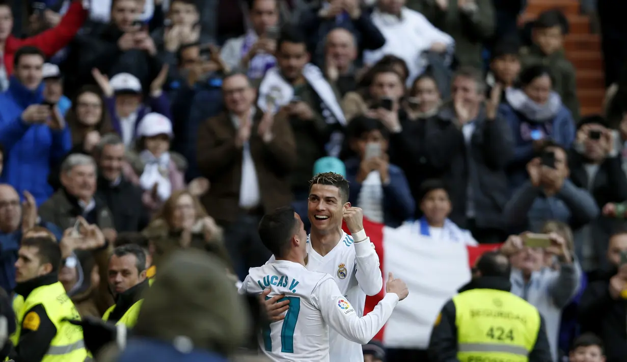 Ekspresi pemain Real Madrid, Cristiano Ronaldo merayakan gol ke gawang Alaves pada La Liga Santander di Santiago Bernabeu stadium, Madrid, (24/2/2018). Real Madrid menang 4-0. (AP/Francisco Seco)