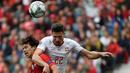 Gelandang Portugal, Joao Felix berebut bola udara dengan Bek Swiss, Fabian Schar selama pertandingan semifinal Liga Bangsa-Bangsa UEFA di stadion Dragao di Porto pada 5 Juni 2019. (AFP Photo/Miguel Riopa)