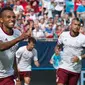 Pemain Bayern Munchen, Julian Green, usai mencetak gol ke gawang Inter Milan, pada laga lanjutan International Champions Cup 2016, di Charlotte, AS, Sabtu (30/7/2016). (AFP/Nicholas Kamm). 