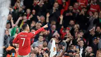 Selebrasi striker Manchester United, Cristiano Ronaldo setelah mencetak gol ke gawang Sheriff Tiraspol pada laga Grup E Liga Europa 2022/2023 di Old Trafford Stadium, Manchester (27/10/2022). Critiano Ronaldo hanya 1,5 musim mengenakan nomor punggung 7 di periode keduanya bersama MU. Pada tengah musim 2022/2023 ia cabut dari MU untuk berpetualang bersama Al Nassr di Liga Arab Saudi. (AFP/Lindsey Parnaby)