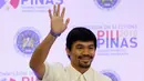 Ekspresi Manny Pacquiao seusai resmi diangkat sebagai senator, di Manila, Filipina, Kamis (19/5). Pacquiao berhasil menduduki 1 dari 12 kursi senator di Majelis Tinggi setelah mendapat 16 juta suara. (REUTERS/Erik De Castro)