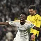 Pemain Real Madrid Vinicius Junior merayakan gol ke gawang Dortmund hasil give away pemain keturunan Indonesia di final Liga Champions (AFP)