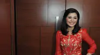 Motivator Merry Riana saat menghadiri gala premier film yang menceritakan tentang dirinya di Plaza Senayan, Jakarta, Senin (22/12/2014). (Liputan6.com/Herman Zakharia)