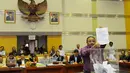 Anggota Komisi III DPR Fraksi PKS, Abu Bakar Al Habsy saat pemungutan suara untuk pemilihan Calon Hakim Agung, Jakarta, (18/9/14). (Liputan6.com/Andrian M Tunay) 