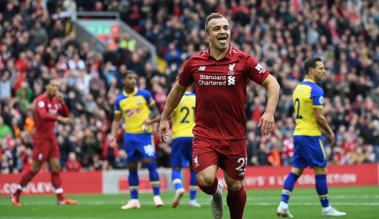 Puncaknya ia gagal membawa Stoke City lolos dari jurang degradasi. Sadar akan potensi Shaqiri, Liverpool memboyongnya dan kini menjadi pilar penting di Anfield bersama Salah. (AFP/Paul Ellis)