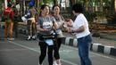 Peserta fun run saat mengikuti event lari bertajuk 'Run and Snap in Tangerang 5k' di Tangerang, Minggu (8/3/2020). Novotel Tangerang gelar event lari yang diikuti ratusan peserta. (Dokumentasi)