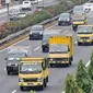 Sejumlah truk melintas di ruas Tol Dalam Kota Cawang-Pluit, Jakarta, Rabu (8/8). Mulai 18 Agustus-2 September 2018 atau selama perhelatan Asian Games, Pemprov DKI menerapkan pembatasan truk golongan III, IV, dan V. (Merdeka.com/Iqbal S. Nugroho)