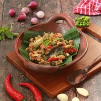 ilustrasi tumis oncom/Catursari/Shutterstock