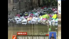 Curah hujan yang tinggi ditambah pasang air laut diduga menjadi penyebab banjir tak kunjung surut.