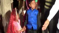Tak ada keceriaan menghiasi wajah lugu anak-anak pada acara pernikahan anak massal di Rajasthan, India utara.