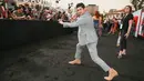 Aktor Indonesia, Iko Uwais memeriahkan acara gala premier film Mile 22 di Los Angeles, Kamis (9/8). Iko Uwais berperan sebagai polisi Indonesia yang bekerja sama dengan agen CIA dalam film besutan Peter Berg tersebut. (Rich Fury/Getty Images/AFP)