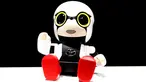 Toyota Motor Corp memperkenalkan robot mini buatannya di Tokyo, Jepang pada 27 September 2016. Robot mini ini diberi nama Kirobo Mini. (REUTERS/Kim Kyung-Hoon)