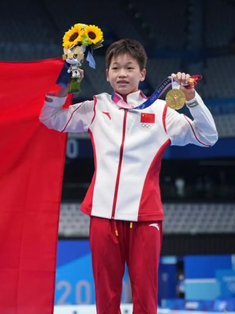 Keluarga Quan Hongchan telah menolak properti dan uang tunai gratis setelah kesuksesan Olimpiadenya ( Gambar: Layanan Berita China melalui Getty Images)