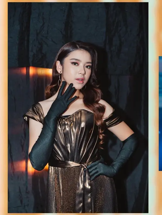 Adapun gaya makeup glamor lainnya yang bisa jadi inspirasi adalah dengan pulasan eyeliner bergaya cat eyes. Untuk mengimbanginya, maka padukan dengan warna bibir natural. (Instagram: @tiaraandini)