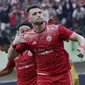 Striker Persija, Marko Simic, melakukan selebrasi usai membobol gawang Mitra Kukar pada laga perempat final Piala Presiden di Stadion Manahan, Solo, Minggu, (4/2/2018). Persija menang 3-1 atas Mitra Kukar. (Bola.com/M Iqbal Ichsan)