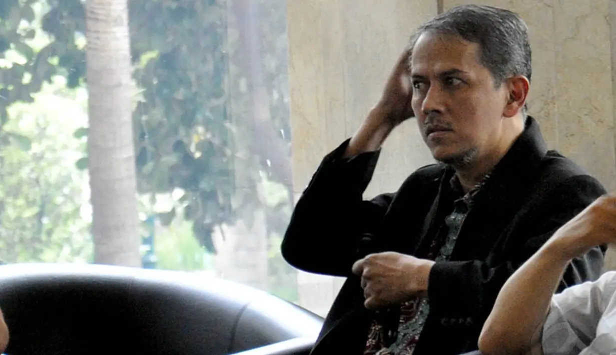 Anggito Abimanyu diperiksa sebagai saksi kasus dugaan korupsi penyelenggaraan ibadah haji di Kemenag dengan tersangka Suryadharma Ali, Jakarta, (7/9/14). (Liputan6.com/Miftahul Hayat)