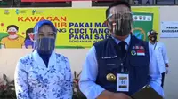 Terdaftar sebagai relawan uji klinis, Gubernur Jawa Barat Ridwan Kamil tiba di Puskesmas Garuda, Kota Bandung, pukul 13.00 WIB siang. (Liputan6.com/Huyogo Simbolon)