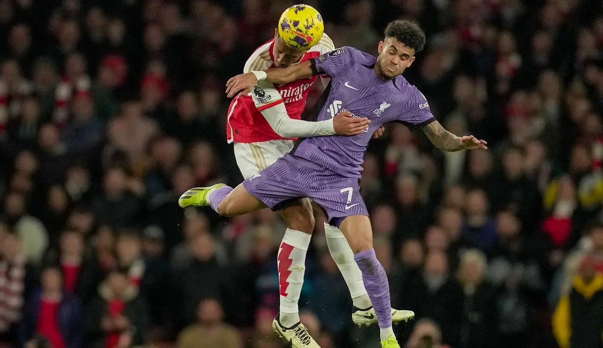 Arsenal berhasil menumbangkan perlawanan Liverpool dengan skor 3-1. (AP Photo/Kin Cheung)