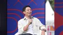 Rio Haryanto saat sesi bincang santai pada gelaran Vidio Sports Festival resmi digelar di Plaza Timur Senayan, Jakarta, pada Sabtu (18/10/2025). (Bola.com/M Iqbal Ichsan)