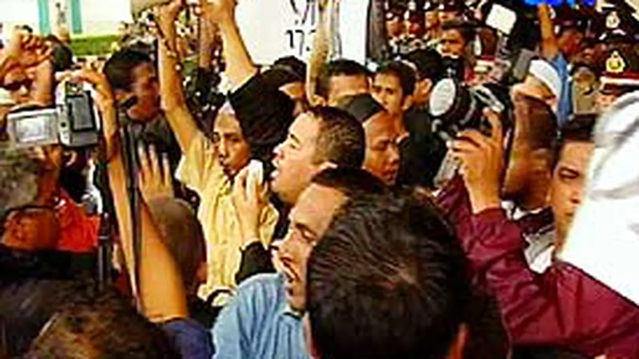 070206cdemo-karikatur.jpg
