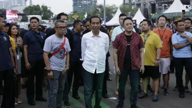 Jokowi nonton WTF 2018 (Hak Cipta: KapanLagi.com®/Agus Apriyanto/ssm)