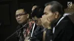 Terdakwa korupsi pengadaan dan pelaksanaan pembangunan kampus IPDN Sumbar di Kab Agam TA 2011, Dudy Jocom menjalani sidang lanjutan di Pengadilan Tipikor Jakarta, Rabu (12/9). Sidang mendengar keterangan saksi dari JPU. (Liputan6.com/Helmi Fithriansyah)