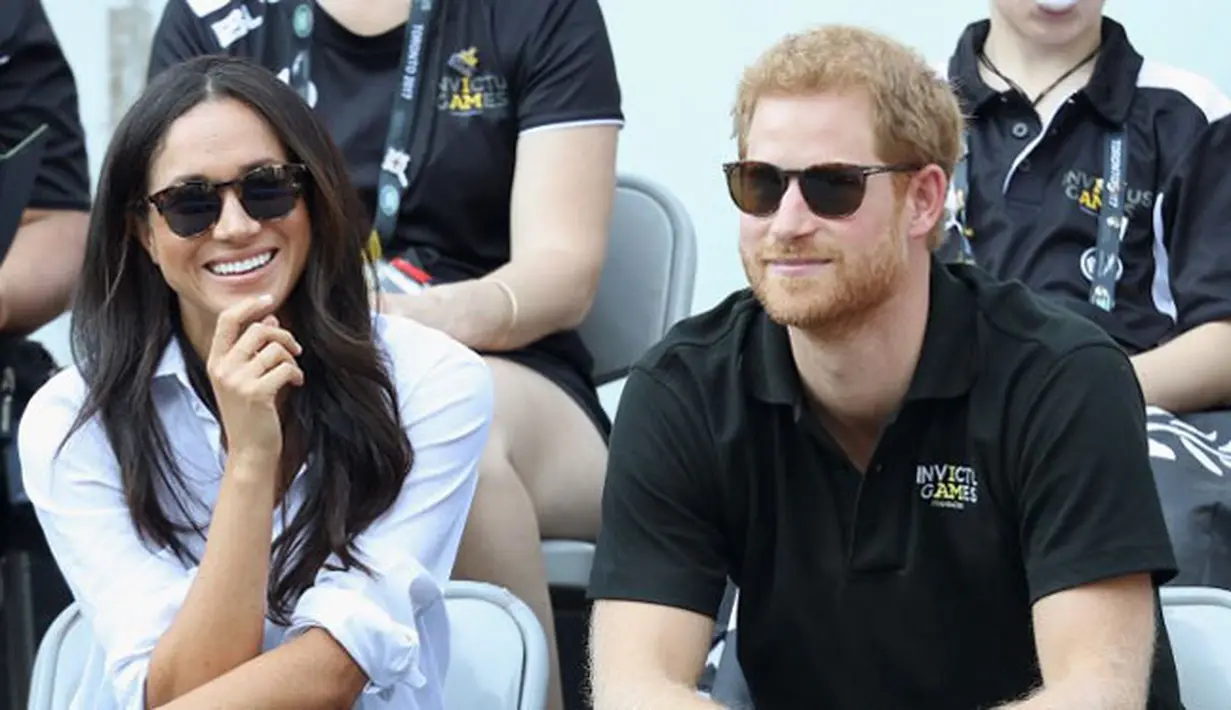 Sejak diberitakan memiliki hubungan spesial, pasangan kekasih Meghan Markle dan Pangeran Harry jarang sekali tampil di depan umum bersama. Namun belakangan, keduanya pun sudah tak malu lagi melakukannya. (AFP/Chris Jackson)
