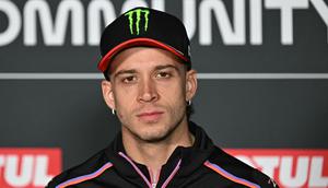 Pembalap Aprilia, Marco Bezzecchi pada sesi konferensi pers jelang MotoGP Valencia 2025. (Javier SORIANO / AFP)