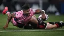 Center Prancis Stade Francais, Jonathan Danty, mencetak gol dalam pertandingan rugby union Top 14 Prancis antara Stade Francais dan Lyon di Stadion Jean-Bouin di Paris, pada 28 Mei 2021. (Foto: AFP/Anne-Christine Poujoulat)