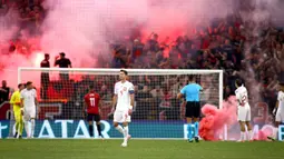 Albania memanfaatkan dengan baik status sebagai tuan rumah ketika menghadapi Polandia pada laga kelima Grup E Kualifikasi Euro 2024. Albania menang telak 2-0 atas Polandia. (AP Photo/Franc Zhurda)